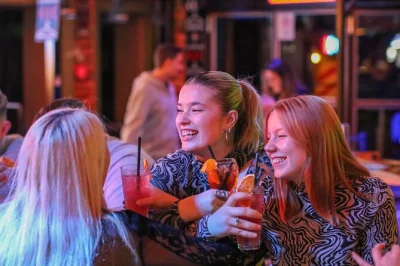 Meet fellow travelers, sip hungarian fröccs, and explore budapest’s iconic ruin bars on a lively night tour. includes 2 drinks, 4 shots, and local stories.