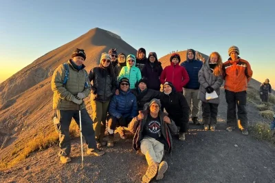Feel the heat of acatenango volcano on a guided overnight hike from antigua, camp under the stars, share hot chocolate with locals, and wake to sunrise views. includes gear.