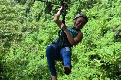 Feel the rainforest mist, zipline near arenal volcano, visit waterfalls and relax in hot springs on this full-day costa rica tour from san jose with lunch and dinner included.