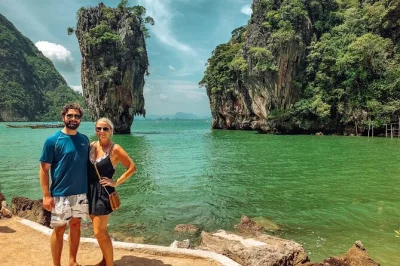 Start your phuket day trip with hotel pickup, private longtail boat to james bond island, canoeing sea caves, and lunch at koh panyee village. all fees included.
