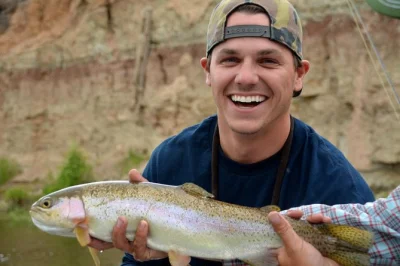 Feel the tug of wild trout on a private jackson hole fly fishing trip. fish the snake or green river, enjoy lunch, and relax—gear, guide, and pickup included.