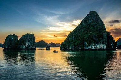 Feel the limestone cliffs of ha long bay up close on a private day trip from hanoi with cave walks, floating village kayaking, seafood lunch & hotel pickup included.