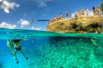 Feel the caribbean breeze on san andres with a local-guided white train tour, stops for swimming, music, and a taste of coco loco. includes up to 6 highlights.