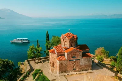 Cross into north macedonia for a full-day journey from tirana, circling lake ohrid, exploring ancient churches, saint naum monastery, and local paper-making. includes border fees.