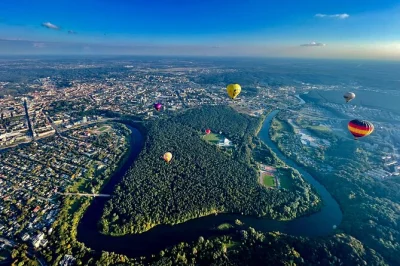 Float above vilnius or trakai by hot air balloon, see lakes and trakai castle, includes hotel pickup and a glass of champagne. small group, weather dependent.