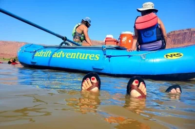 Float the colorado river near moab past fisher towers, with small rapids, stories from your guide, and a peaceful morning vibe. includes water and all fees.