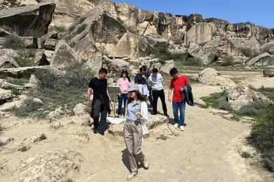 Feel ancient rock art in qobustan, walk baku’s old city, watch flames at ateshgah & yanar dag. includes comfortable transport, guide & local lunch.