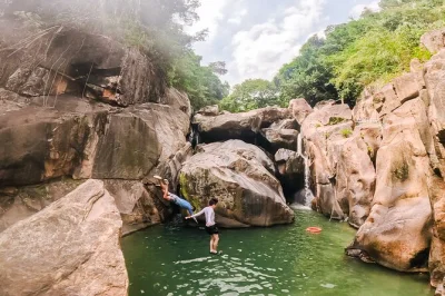 Feel the rush of ba ho waterfall near nha trang—swim in clear pools, try cliff jumping, and share laughs with your local guide. includes transport and lunch.