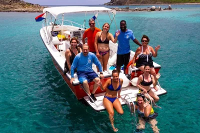 Swim at creole rock near st martin, snorkel with tropical fish, spot rare frogfish, and snack on fresh baguette. small group tour with drinks and gear included.