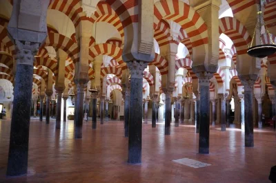 Walk beneath córdoba’s arches, hear stories of the mosque-cathedral’s past, and skip the lines with a local guide—tickets and audio receiver included.