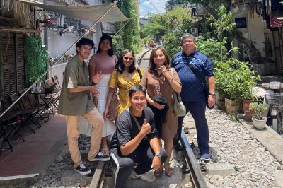 Feel hanoi’s pulse on a small group city tour—walk train street, explore hoa lo prison, sip street coffee, and see ancient pagodas. includes guide & entry fees.