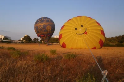 Float above northeast mallorca at sunrise or sunset in a small group hot air balloon ride, with champagne toast, photos, and local pilot—includes flight certificate.