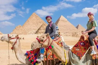 Feel the ancient energy at giza with a private tour—walk inside a pyramid, ride camels by the sphinx, and share lunch with your egyptologist guide. pickup included.
