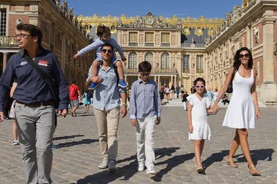 Step into royal history at versailles with a private guide, explore the hall of mirrors, stroll the gardens, and enjoy hotel pickup plus macarons for a sweet finish.