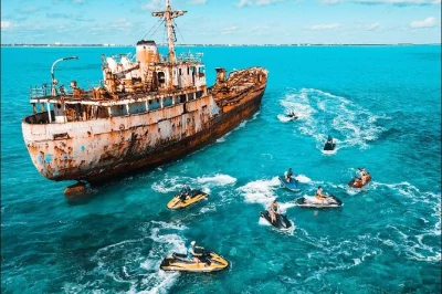 Feel the rush jet skiing past the la famille ghost ship, exploring hidden cays and untouched beaches in turks & caicos. guided tour with stops only locals know.