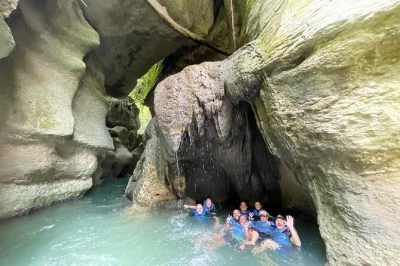 Start early from san juan for river caving, cliff jumping, and a hidden spring in puerto rico’s lush forest. small group adventure with local guide and lunch stop.