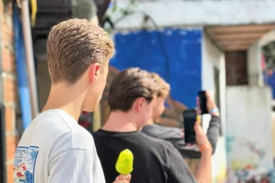 Walk medellin’s comuna 13 with neighborhood guides, try street snacks, see graffiti art and catch live dance shows. includes ice cream, graffiti experience, and guide.