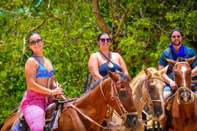 Explore punta cana com passeio a cavalo, aventura de atv, degustação de café dominicano em fazenda local, banho em gruta aquática e final na praia de macao — transporte incluso.