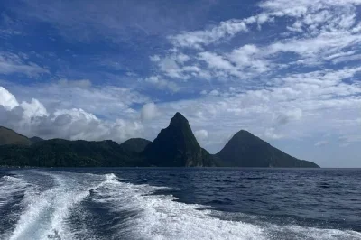 Feel the sea breeze on a st lucia cruise to soufriere, swim at sugar beach, soak in sulphur springs, and enjoy local lunch. includes snorkeling gear and transfers.