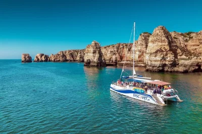 Feel the algarve’s wild side on a lagos catamaran cruise—sea caves, swim stops, paddleboards, lunch with drinks, and live commentary. includes pickup and all gear.