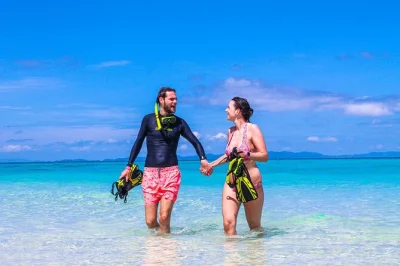 Swim at maya bay, snorkel phi phi’s reefs, spot monkeys from the boat, and enjoy a buffet lunch with hotel pickup. includes gear, snacks, and local guide.