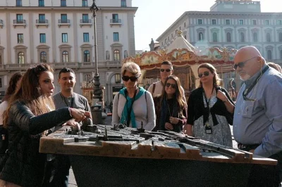 Step into florence’s heart on a guided walk—stories of medici, secret corners, and the wine windows tradition. includes earphones, local guide, and tasting.