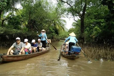 Entdecke das ruhige mekong-delta: sampan fahren, lokale schokolade probieren, gemeinsam mit einheimischen kochen und entspannt cai be mit dem rad erkunden. inklusive hoteltransfer.