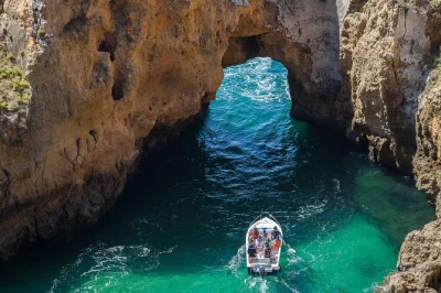 Feel the atlantic breeze on a private algarve coast tour—lagos old town, ferragudo village, cliffside chapels, and optional ponta da piedade boat caves. includes hotel pickup.