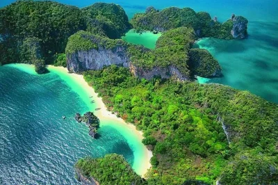 Erlebe die hong islands & 4 islands auf einer privaten longtail-bootstour mit sonnenuntergang am railay beach, nachtschnorcheln, mittagessen und hoteltransfer inklusive.