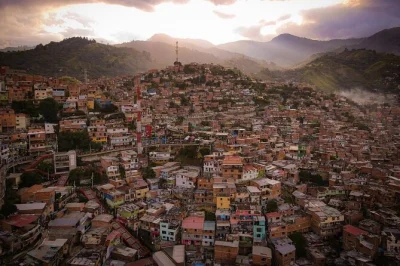 Discover medellín’s transformation on a private tour. visit comuna 13, ride the cable car, explore plaza botero & taste local fruits at a farmers market.