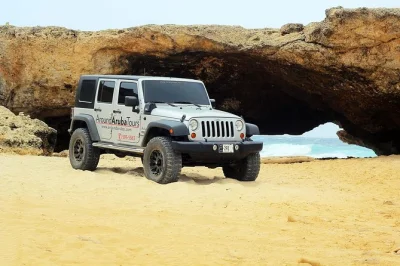 Feel aruba’s wild side on a private jeep tour—explore gold mill ruins, swim in a cave pool, and wander hidden beaches with pickup and local guide included.