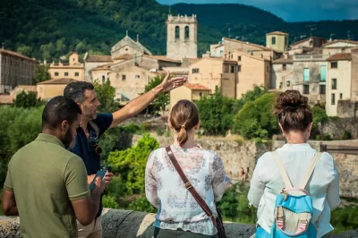 Start in barcelona and wander medieval besalú, explore rupit’s stone streets, and walk tavertet’s cliffside paths with a local guide. small group tour with pickup.