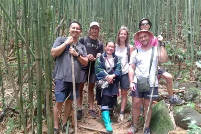 Walk sapa’s rice terraces, cross bamboo forests, and share lunch in ta van village with a local guide. includes hotel pickup, private transport, and entry fees.