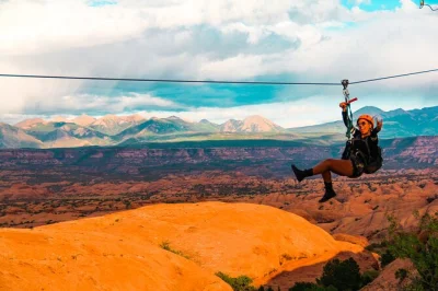 Feel the desert wind on a moab zip line adventure, with a 20-minute off-road ride, canyon views, and all gear included. book your spot for real adrenaline.