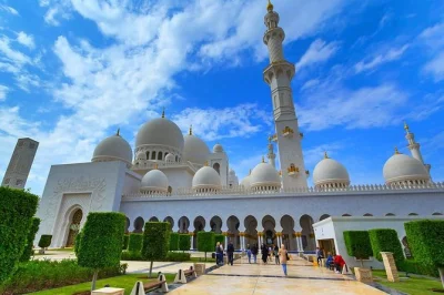 Feel the energy of abu dhabi on a day trip from dubai—see the grand mosque, stroll heritage village, taste dates at the market, and ride at ferrari world. pickup included.