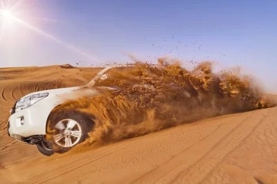 Réservez un safari désert de 6h à dubai avec dune bashing, sandboard, balade à dos de chameau, spectacles en live et dîner bbq. prise en charge, boissons et guide local inclus.