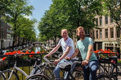 Feel amsterdam’s rhythm on a private bike tour with a local, snack stop, and stories at westerkerk, magere brug & more. includes bike rental and flexible route.