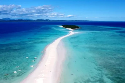 Full-day private nosy iranja tour from nosy be. walk the sandbar, snorkel reefs, meet locals, and enjoy malagasy lunch. affordable guided experience.