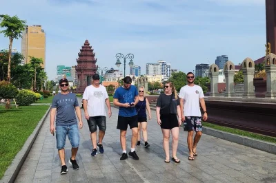 Walk phnom penh’s history with s21, killing fields, markets & riverside stops. small group van tour with local guide, hotel pickup & drinks included.
