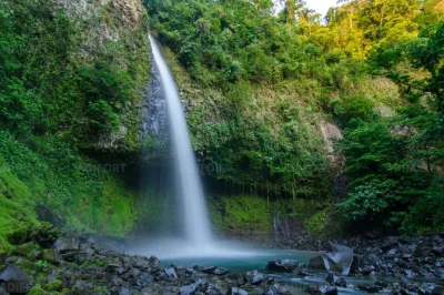 Feel the mist at la fortuna waterfall near arenal, descend rainforest steps, swim in clear water, and skip the ticket line for more time in nature.