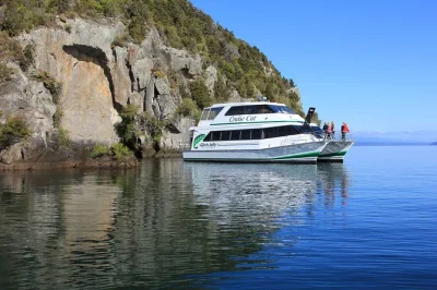 Feel the spray of lake taupo, see maori rock carvings up close, and hear local stories on a relaxed cruise. includes hot homemade muffin and tea or coffee.