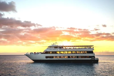 Feel the waikiki breeze on a majestic sunset cocktail cruise with city skyline views, live music, and a welcome drink. includes open-air deck and lounge.