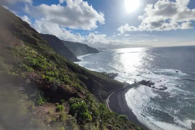 Feel the wild north coast of tenerife on a private tour with volcanic black sand beaches, historic towns, and quiet natural pools. includes pickup & local guide.