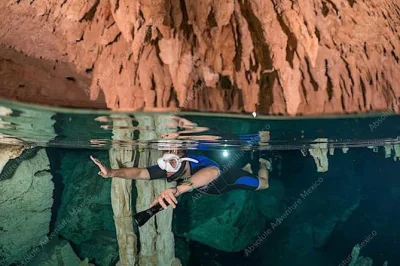 Immergiti nelle acque cristalline del cenote dos ojos, esplora grotte nascoste con una guida privata e gusta un autentico pranzo maya nella giungla—con trasferimento dall’hotel incluso.