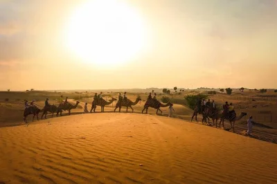 Feel the hush of the dubai desert on a sunset camel ride, try shisha and henna at al khayma camp, and enjoy a bbq dinner with live shows. includes hotel pickup.