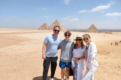 Step into ancient egypt with a private giza pyramids tour from cairo, including sphinx, camel ride, inside pyramid access, and lunch. pickup & expert guide.