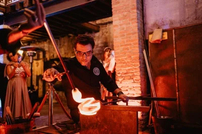 Step inside murano’s glass cathedral for a live glass blowing show, sip prosecco, and watch masters create art in a 12th-century church. includes entry & guide.