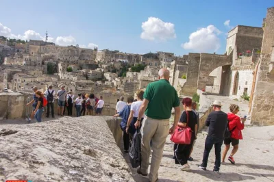 Lose yourself in matera’s ancient sassi on a guided walking tour, step inside a cave house, visit a rock church, and enjoy local tips—includes map & discount voucher.