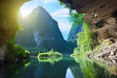 Explore bai dinh pagoda, row through trang an caves, and hike mua cave on a full-day ninh binh tour with buffet lunch and hotel pickup from hanoi.