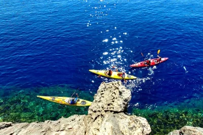 Hear the splash of paddles as you kayak from gozo to comino, explore sea caves and rock arches, and swim in quiet bays. includes all gear and a local guide.